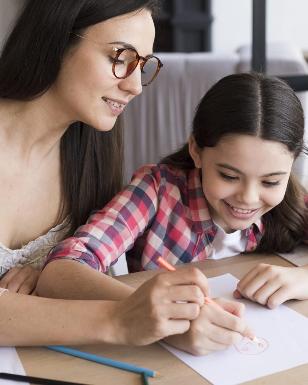 mom-helping-daughter-draw-scaled.jpg